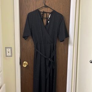 Francesca’s black sparkly jump suit